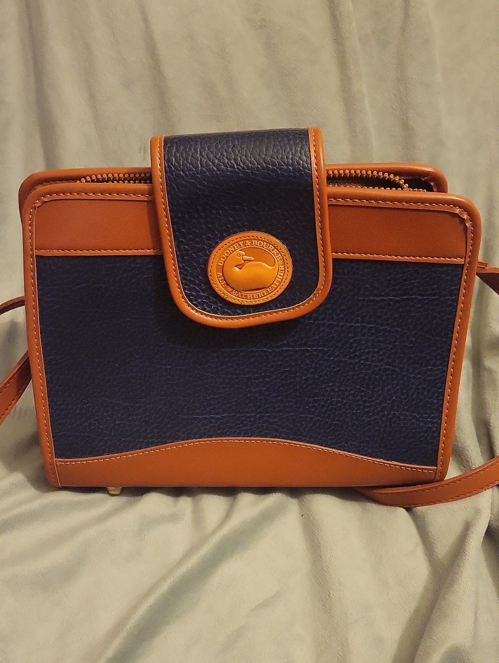 Dooney & Bourke Navy and Tan Pebbled Leather Crossbody
